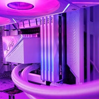 Silver ADATA Lancer Neon DDR5 6800MHz 16GB RAM with RGB lighting in a gaming PC setup