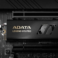 ADATA Legend 970 2TB PCIe Gen 5 NVMe SSD with dual-layer cooling system in sleek black M.2 2280 design.