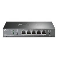 TP-Link Omada ER605 Gigabit VPN router in sleek metallic gray with four Ethernet ports and status indicators.